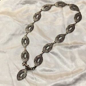 Vintage 90’s Silvertone Concho Style belt.